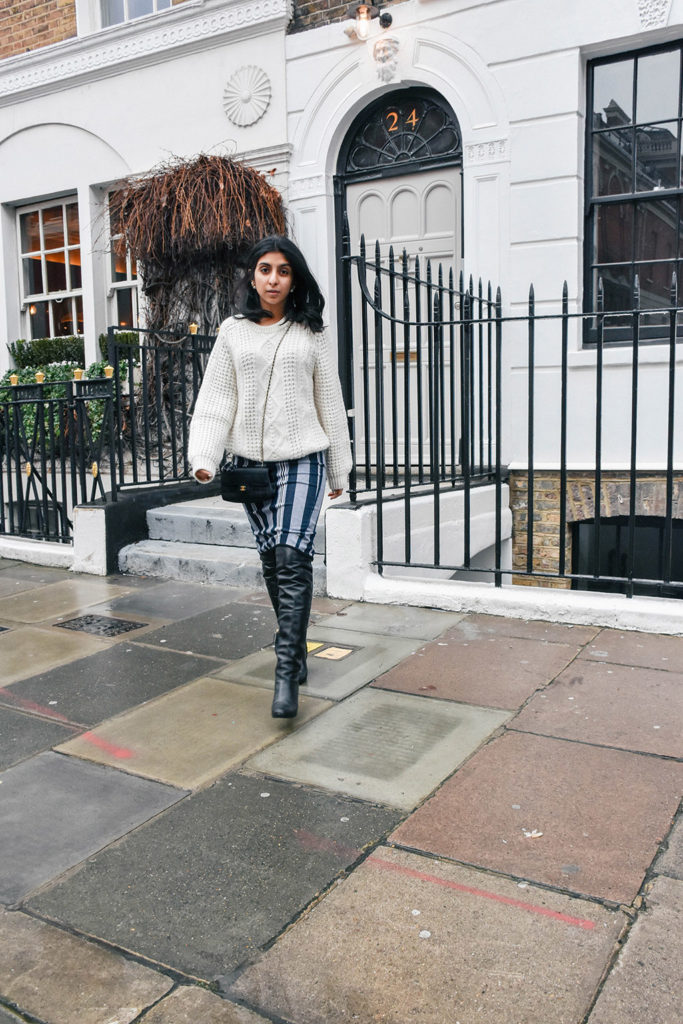 Fashion blogger Shloka Narang of The Silk Sneaker showcases how to mix winter textures and patterns for a high fashion look