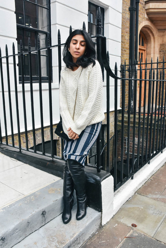 Fashion blogger Shloka Narang of The Silk Sneaker showcases how to mix winter textures and patterns for a high fashion look