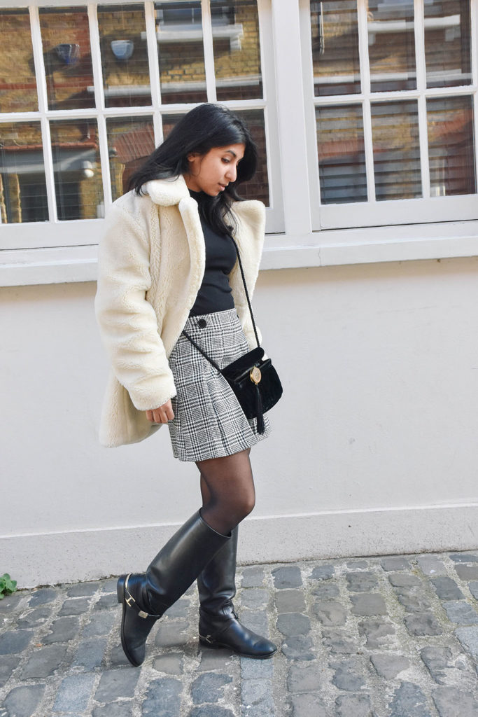 Fashion Blogger Shloka Narang of The Silk Sneaker shows how to style a teddy bear coat for the winter