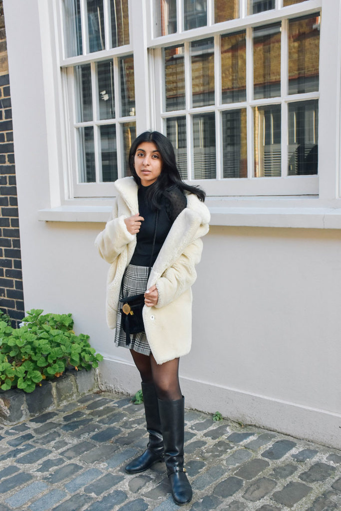 Fashion Blogger Shloka Narang of The Silk Sneaker shows how to style a teddy bear coat for the winter