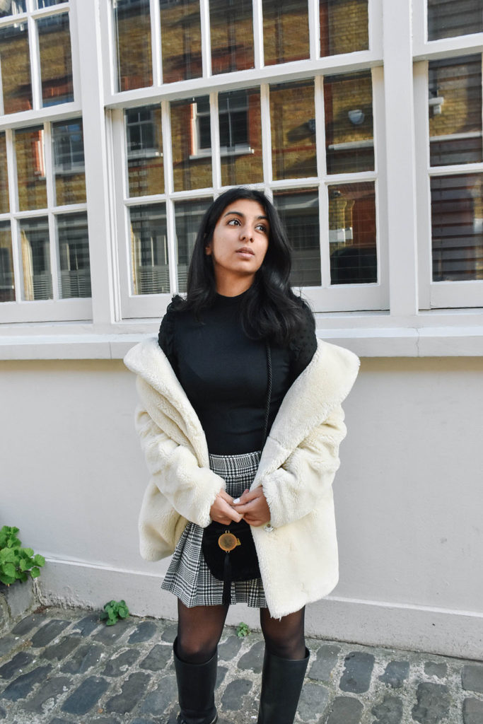 Fashion Blogger Shloka Narang of The Silk Sneaker shows how to style a teddy bear coat for the winter