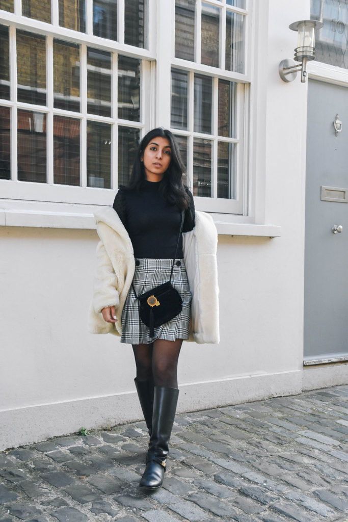 Fashion Blogger Shloka Narang of The Silk Sneaker shows how to style a teddy bear coat for the winter
