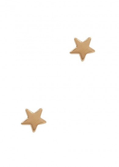 Fashion Blogger Shloka Narang showcases micro trend star pattern featuring Estella Bartlet Earrings