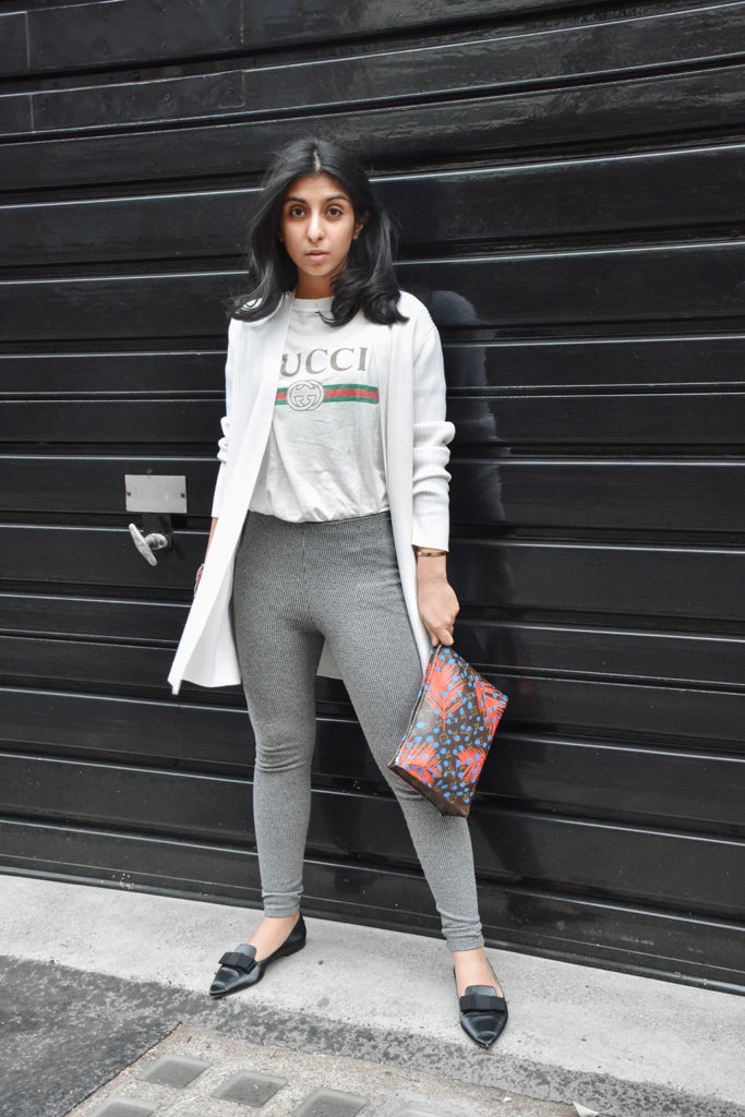 Fashion Blogger Shloka Narang of The Silk Sneaker styles a statement tee featuring a Gucci tee shirt and Louis Vuitton Clutch