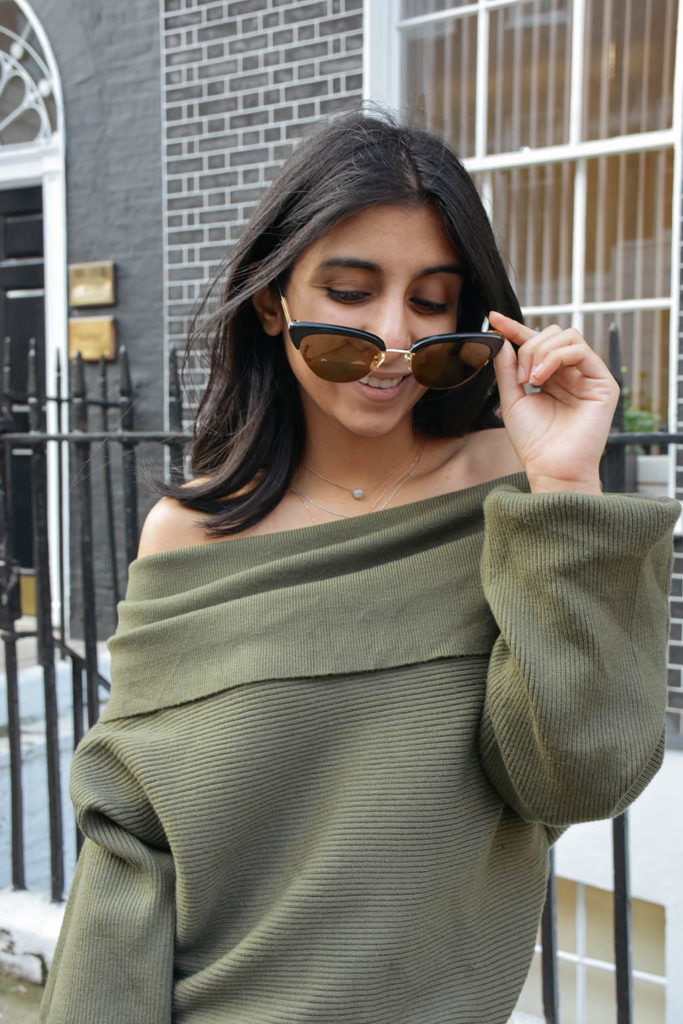 Fashion blogger Shloka Narang of The Silk Sneaker shows how to dress for spring with an off shoulder Zara sweater and Louis Vuitton Pochette Bag