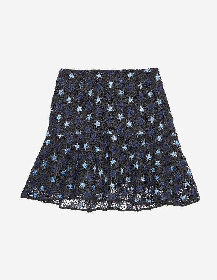 Fashion Blogger Shloka Narang showcases micro trend star pattern featuring Sandro skirt