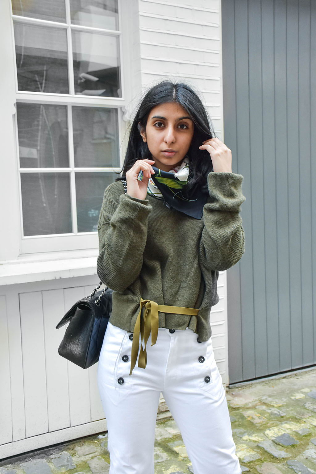 Fashion blogger Shloka Narang showcases a spring outfit to wear now with sailor pants and khaki