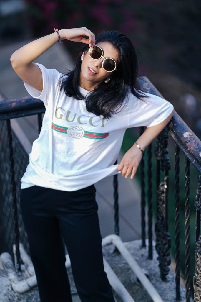 Fashion blogger Shloka Narang of The Silk Sneaker showcases a unique way to style the Gucci Tee Shirt