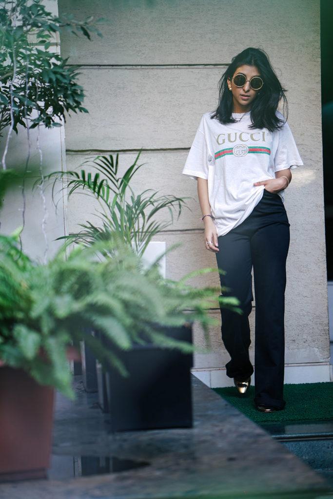 Fashion blogger Shloka Narang of The Silk Sneaker showcases a unique way to style the Gucci Tee Shirt