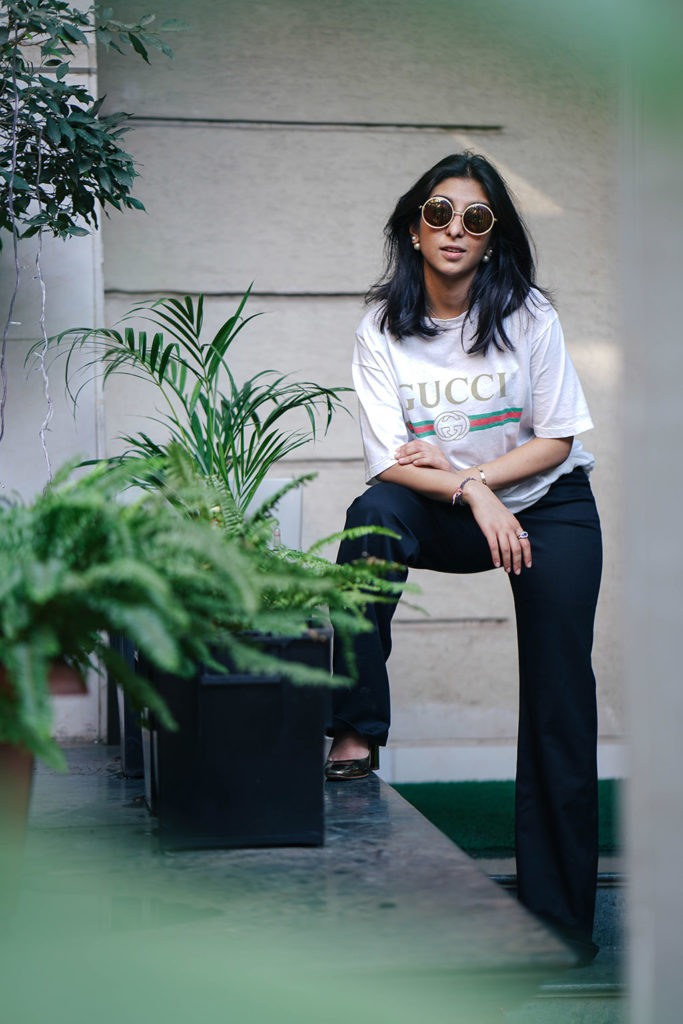 Fashion blogger Shloka Narang of The Silk Sneaker showcases a unique way to style the Gucci Tee Shirt