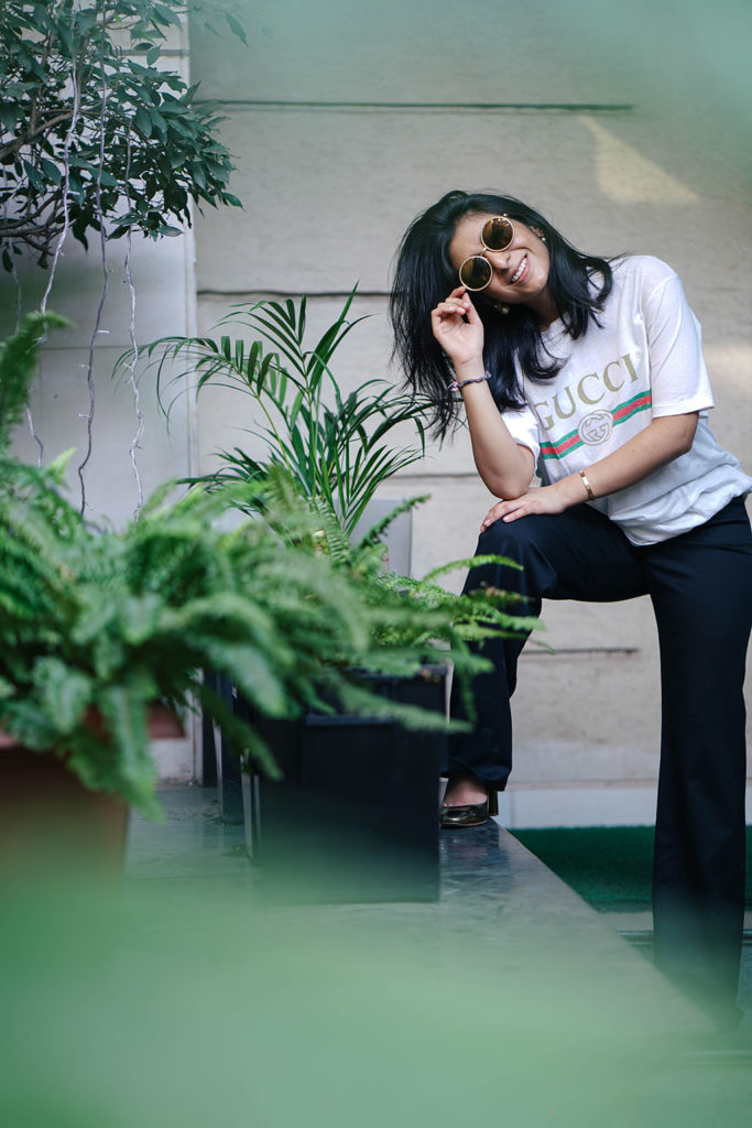Fashion blogger Shloka Narang of The Silk Sneaker showcases a unique way to style the Gucci Tee Shirt