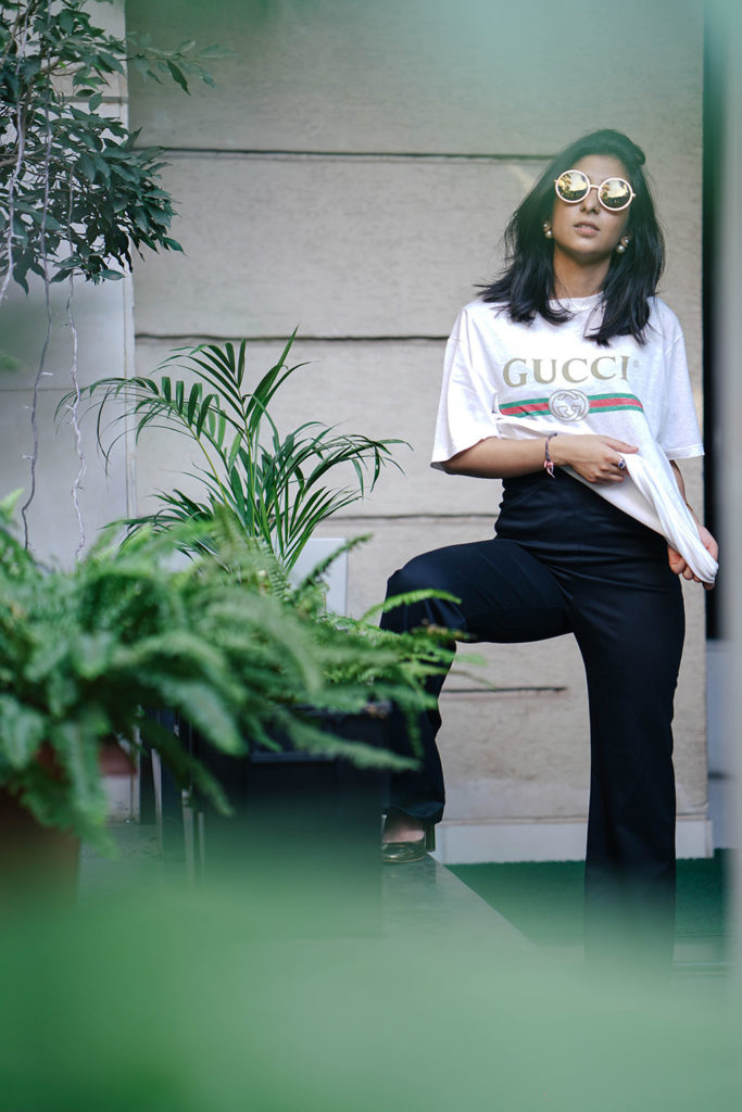 Fashion blogger Shloka Narang of The Silk Sneaker showcases a unique way to style the Gucci Tee Shirt