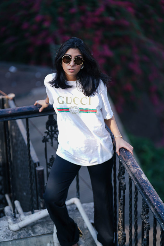 Fashion blogger Shloka Narang of The Silk Sneaker showcases a unique way to style the Gucci Tee Shirt