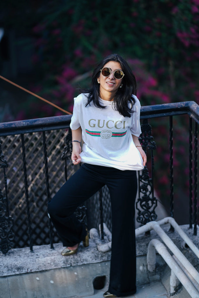 Fashion blogger Shloka Narang of The Silk Sneaker showcases a unique way to style the Gucci Tee Shirt