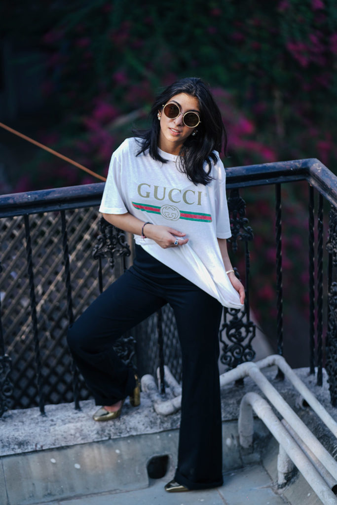 Fashion blogger Shloka Narang of The Silk Sneaker showcases a unique way to style the Gucci Tee Shirt