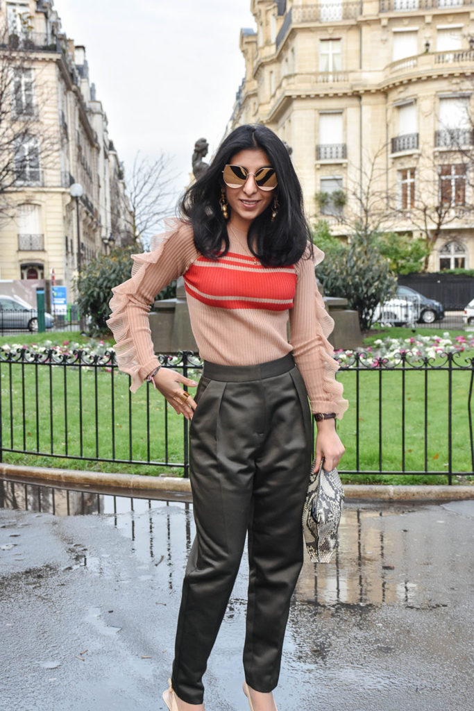 Fashion Blogger Shloka Narang of The Silk Sneaker showcases her Paris Fashion Week outfit and street style showcasing a Self Portrait Top and Topshop Trousers