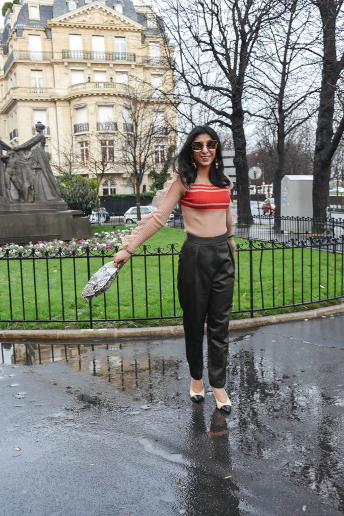Fashion Blogger Shloka Narang of The Silk Sneaker showcases her Paris Fashion Week outfit and street style showcasing a Self Portrait Top and Topshop Trousers