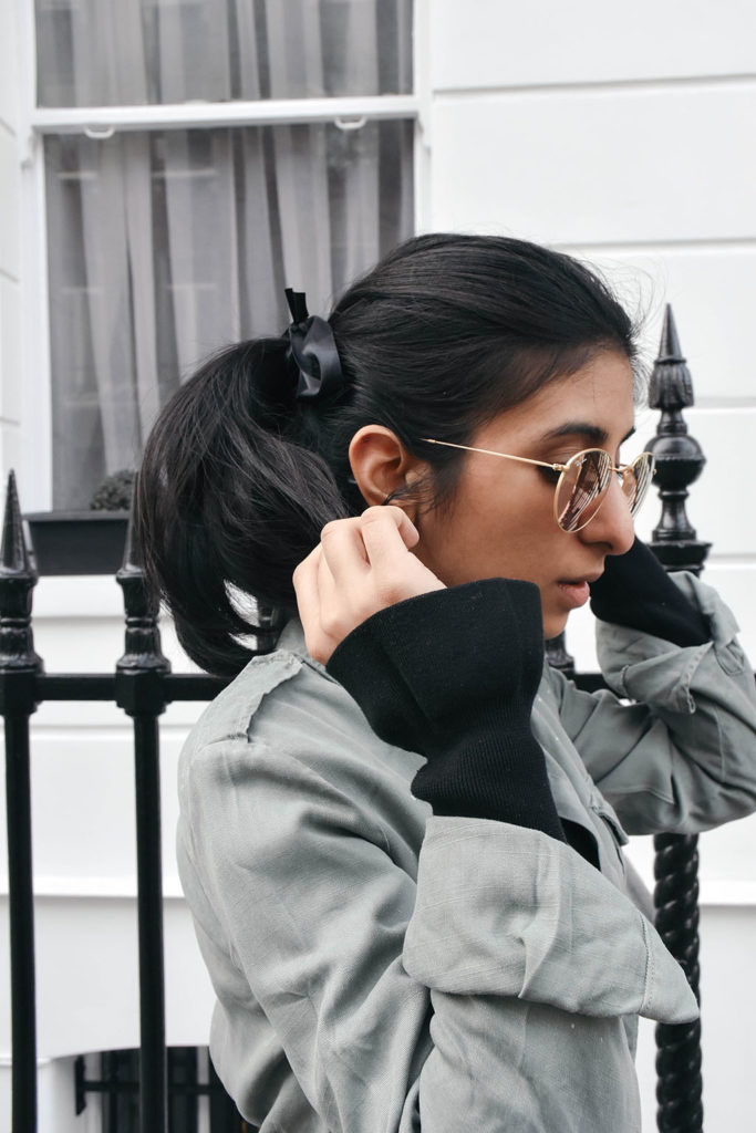 Fashion blogger Shloka Narang of The Silk Sneaker showcases an easy style tip to make a spring dress feel new again with & Other Stories Dress and Zara jacket