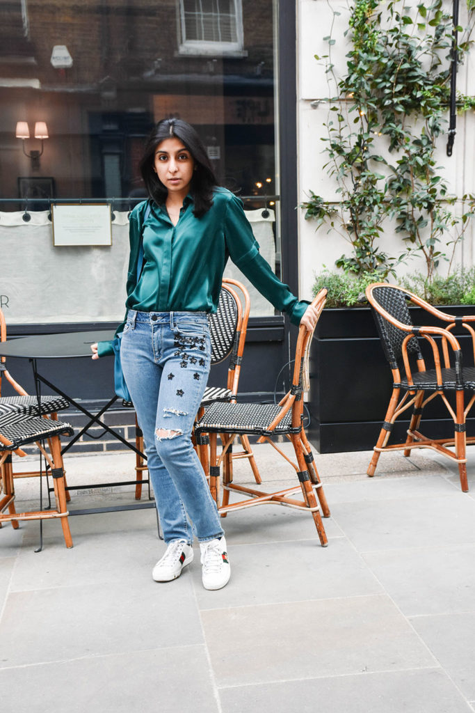 Fashion Blogger Shloka Narang of The Silk Sneaker showcases her embroidered star jeans from Paige in a spring outfit