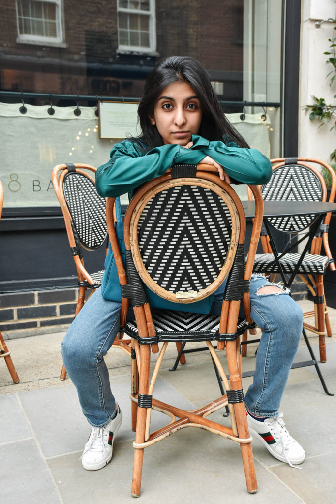 Fashion Blogger Shloka Narang of The Silk Sneaker showcases her embroidered star jeans from Paige in a spring outfit