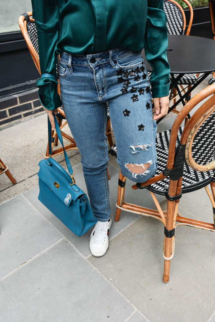 Fashion Blogger Shloka Narang of The Silk Sneaker showcases her embroidered star jeans from Paige in a spring outfit