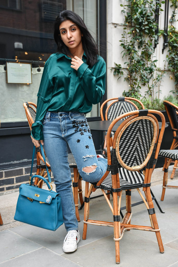 Fashion Blogger Shloka Narang of The Silk Sneaker showcases her embroidered star jeans from Paige in a spring outfit
