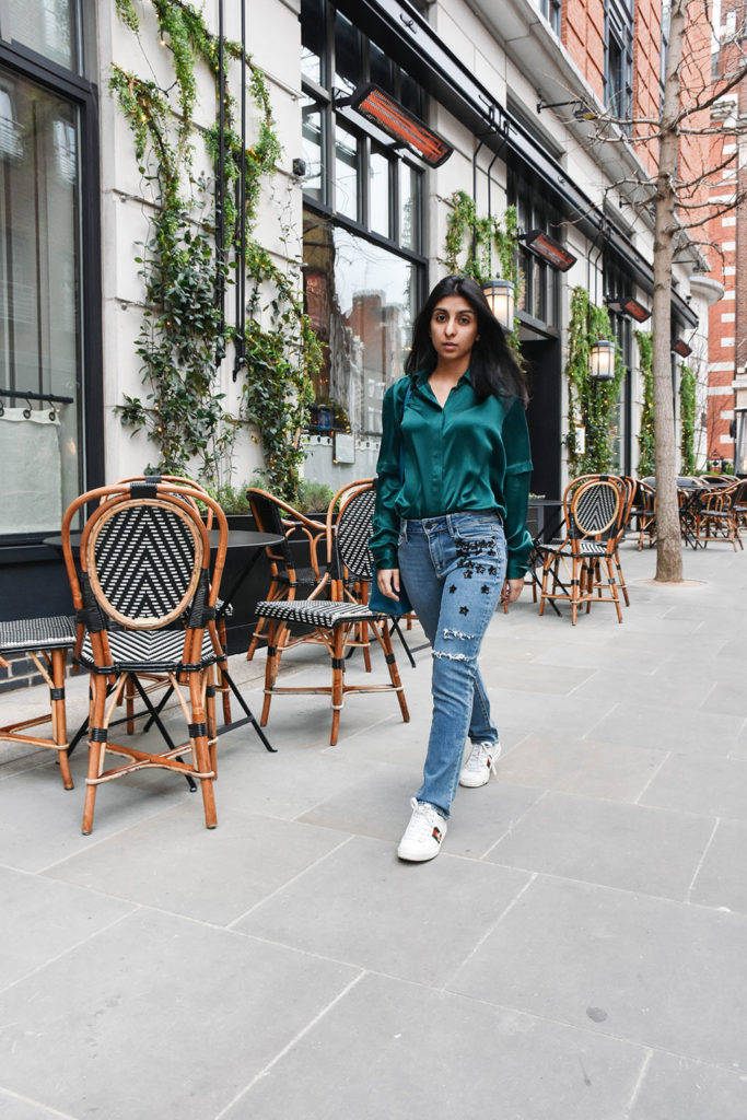 Fashion Blogger Shloka Narang of The Silk Sneaker showcases her embroidered star jeans from Paige in a spring outfit