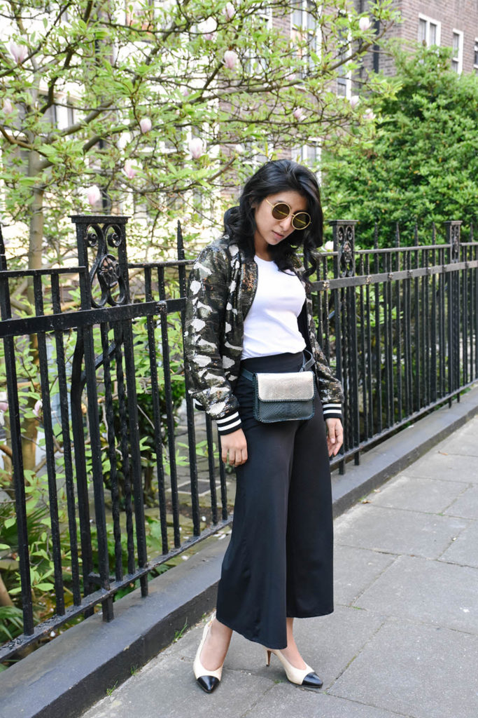 Fashion blogger Shloka Narang of The Silk Sneaker showcases how to wear sequins in the day featuring Topshop Bomber Jacket and ASOS pants
