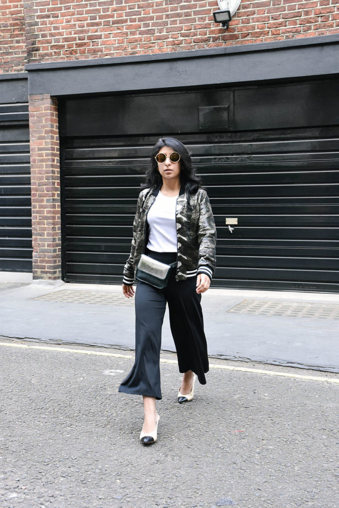 Fashion blogger Shloka Narang of The Silk Sneaker showcases how to wear sequins in the day featuring Topshop Bomber Jacket and ASOS pants