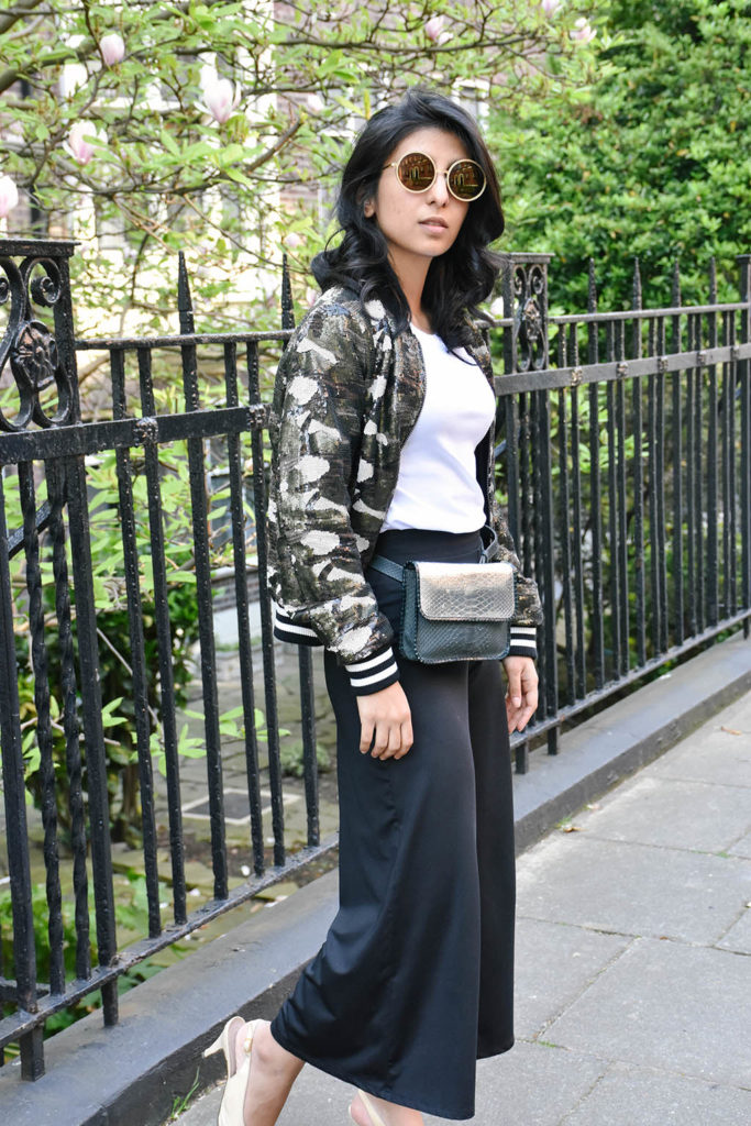Fashion blogger Shloka Narang of The Silk Sneaker showcases how to wear sequins in the day featuring Topshop Bomber Jacket and ASOS pants
