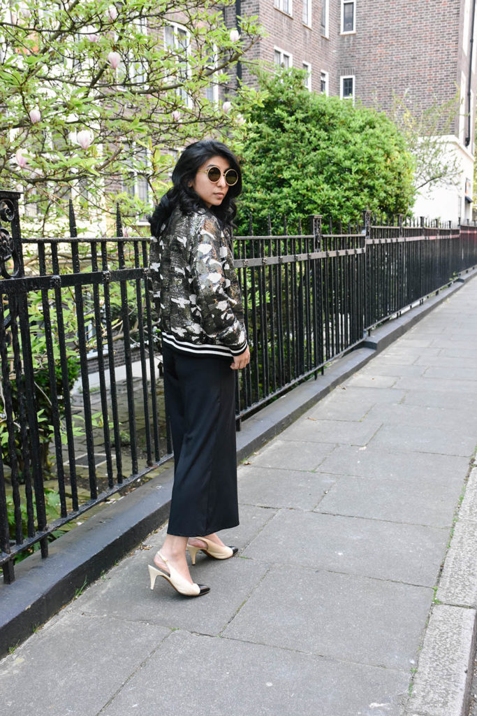 Fashion blogger Shloka Narang of The Silk Sneaker showcases how to wear sequins in the day featuring Topshop Bomber Jacket and ASOS pants