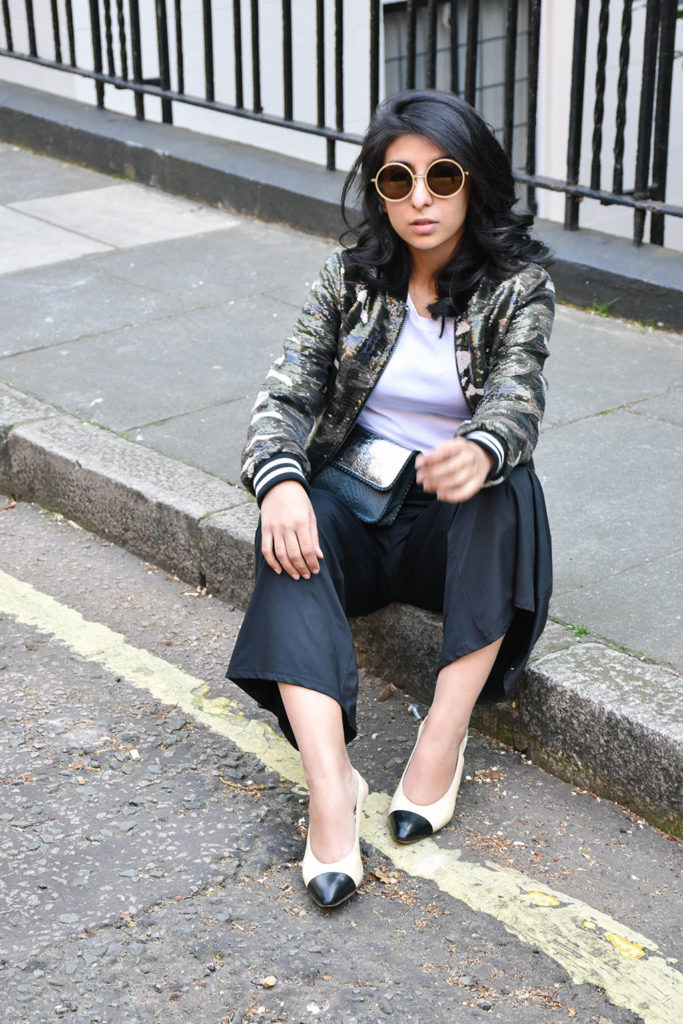 Fashion blogger Shloka Narang of The Silk Sneaker showcases how to wear sequins in the day featuring Topshop Bomber Jacket and ASOS pants
