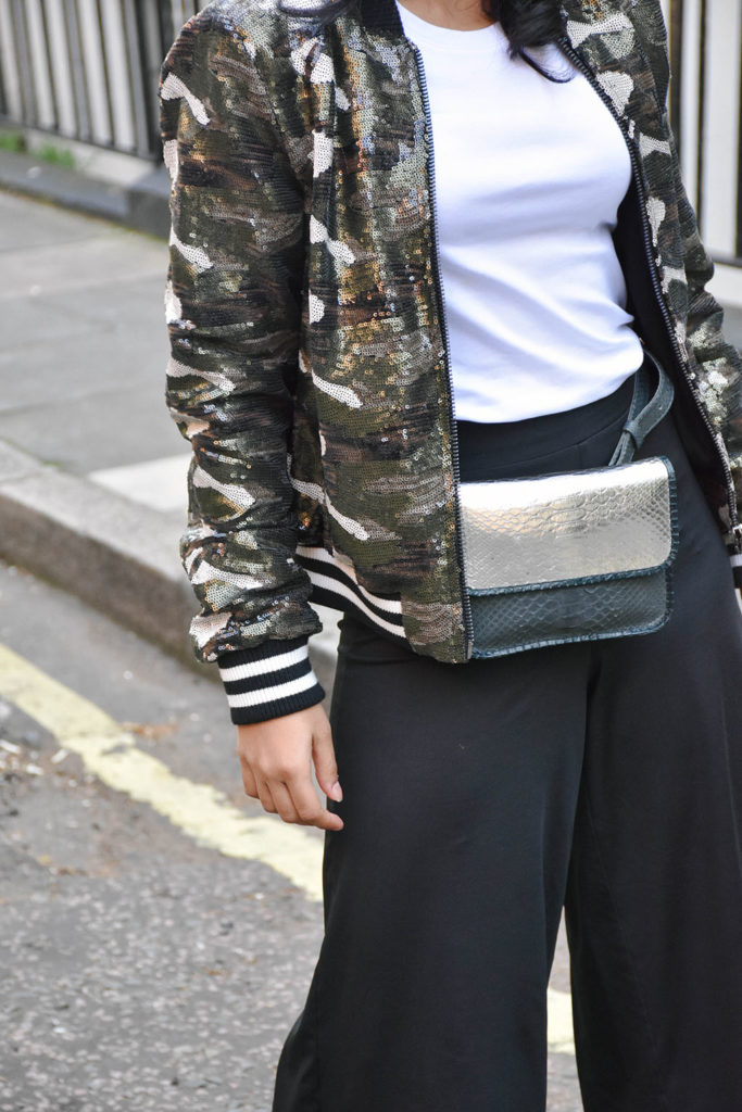 Fashion blogger Shloka Narang of The Silk Sneaker showcases how to wear sequins in the day featuring Topshop Bomber Jacket and ASOS pants