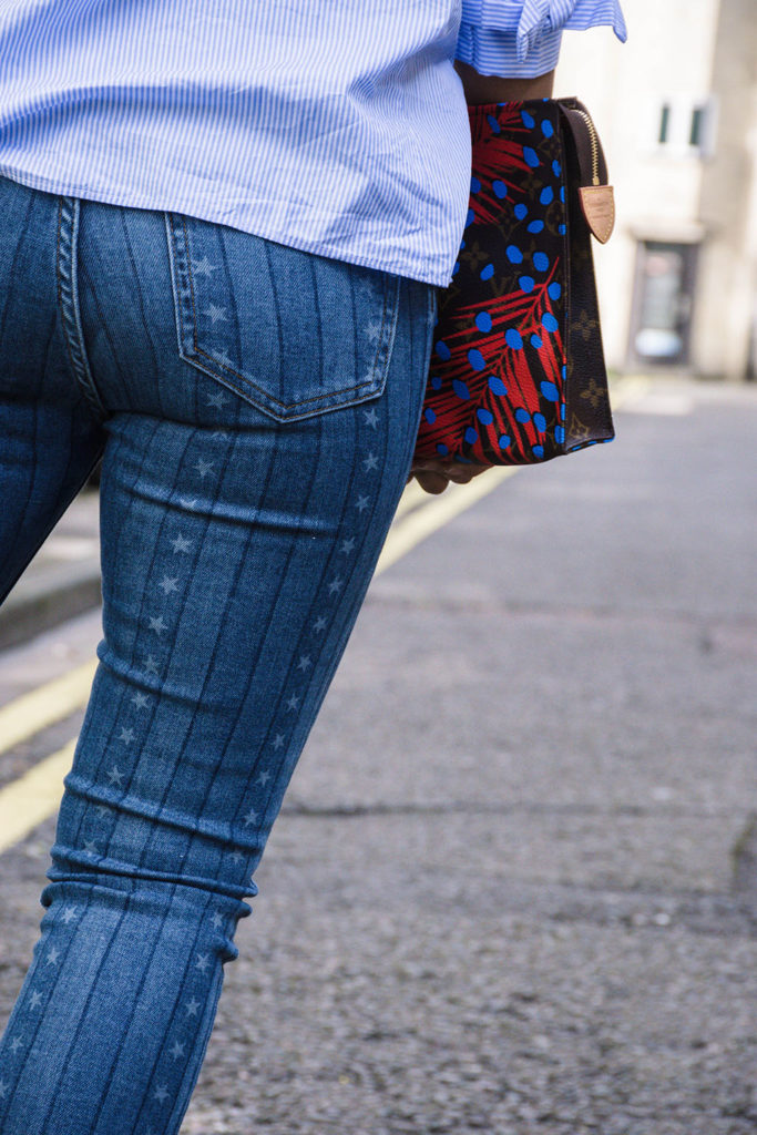 Fashion blogger Shloka Narang showcases how to use a scarf as a headband in the latest bandana hairstyle trend