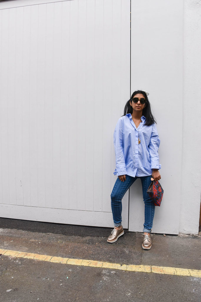 Fashion blogger Shloka Narang showcases how to use a scarf as a headband in the latest bandana hairstyle trend