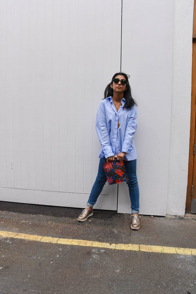 Fashion blogger Shloka Narang showcases how to use a scarf as a headband in the latest bandana hairstyle trend