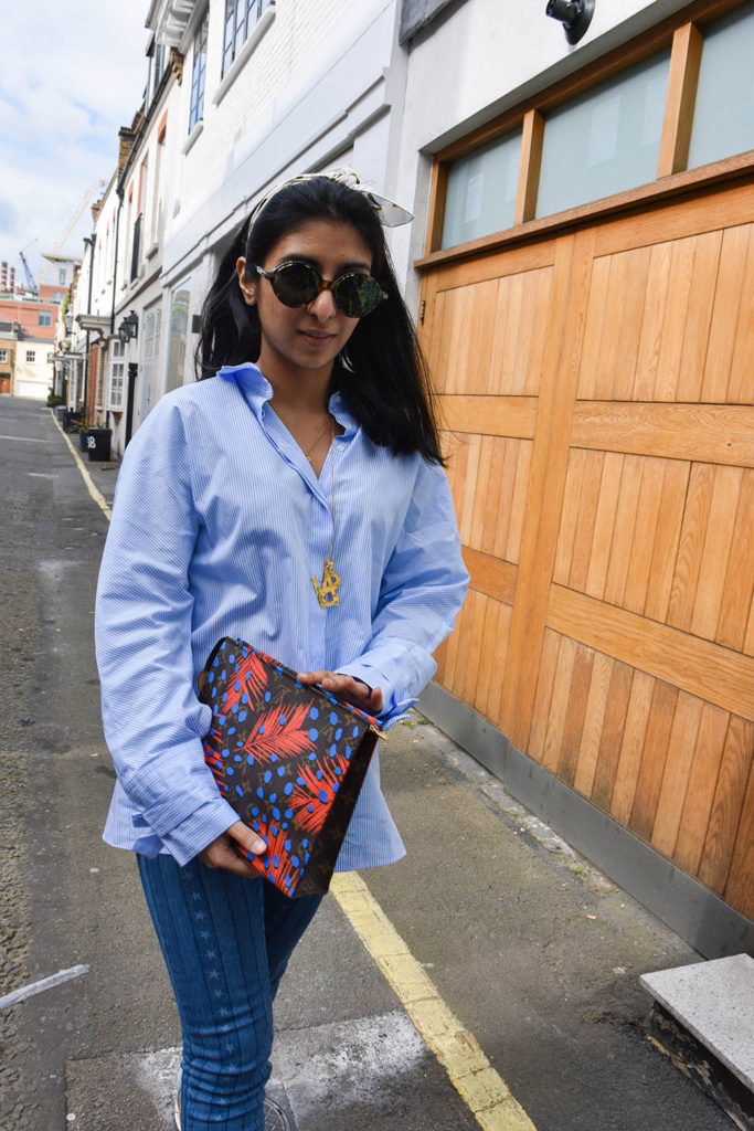 Fashion blogger Shloka Narang showcases how to use a scarf as a headband in the latest bandana hairstyle trend