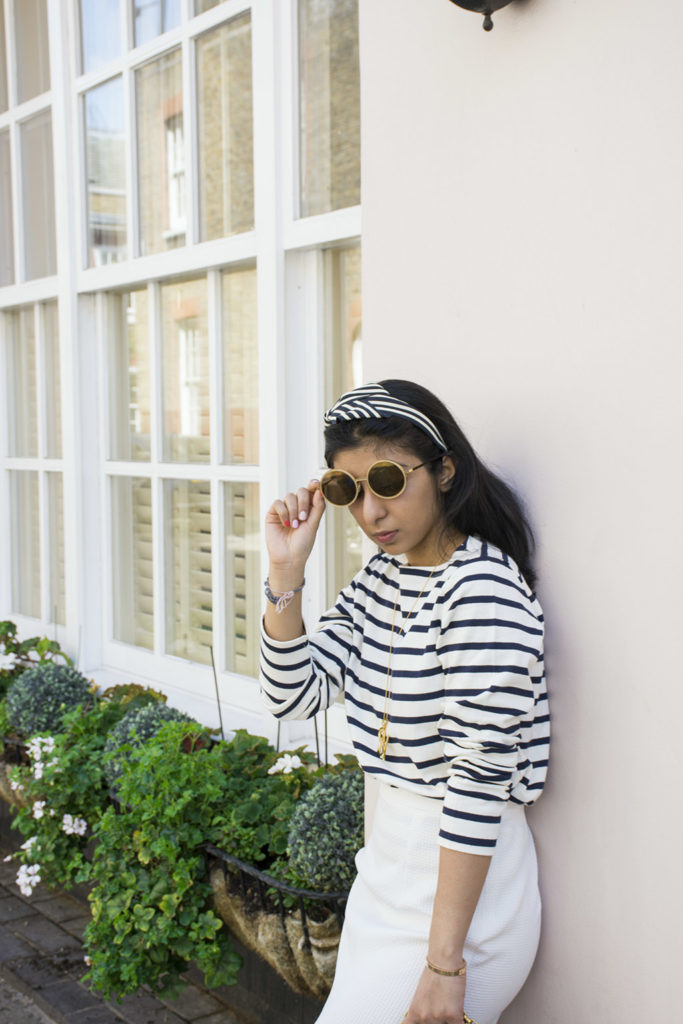 Fashion blogger Shloka Narang of The Silk Sneaker showcases how to wear a striped outfit for summer street style