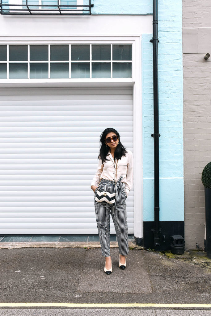 Fashion blogger Shloka Narang showcases how to style striped pants featuring Topshop, Zara and Gucci