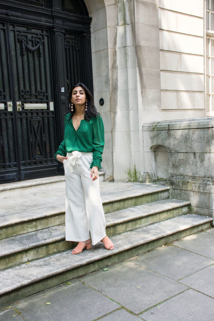 Fashion blogger Shloka Narang of The Silk Sneaker showcases the best summer pants for the London heatwave featuring Topshop and Ba&sh