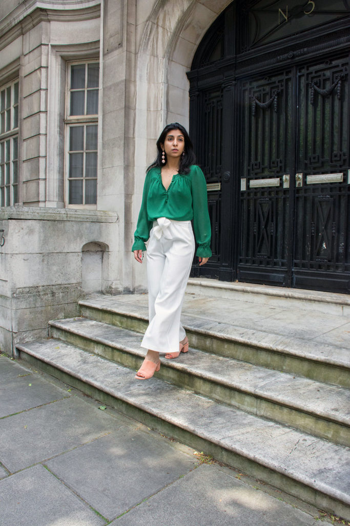 Fashion blogger Shloka Narang of The Silk Sneaker showcases the best summer pants for the London heatwave featuring Topshop and Ba&sh