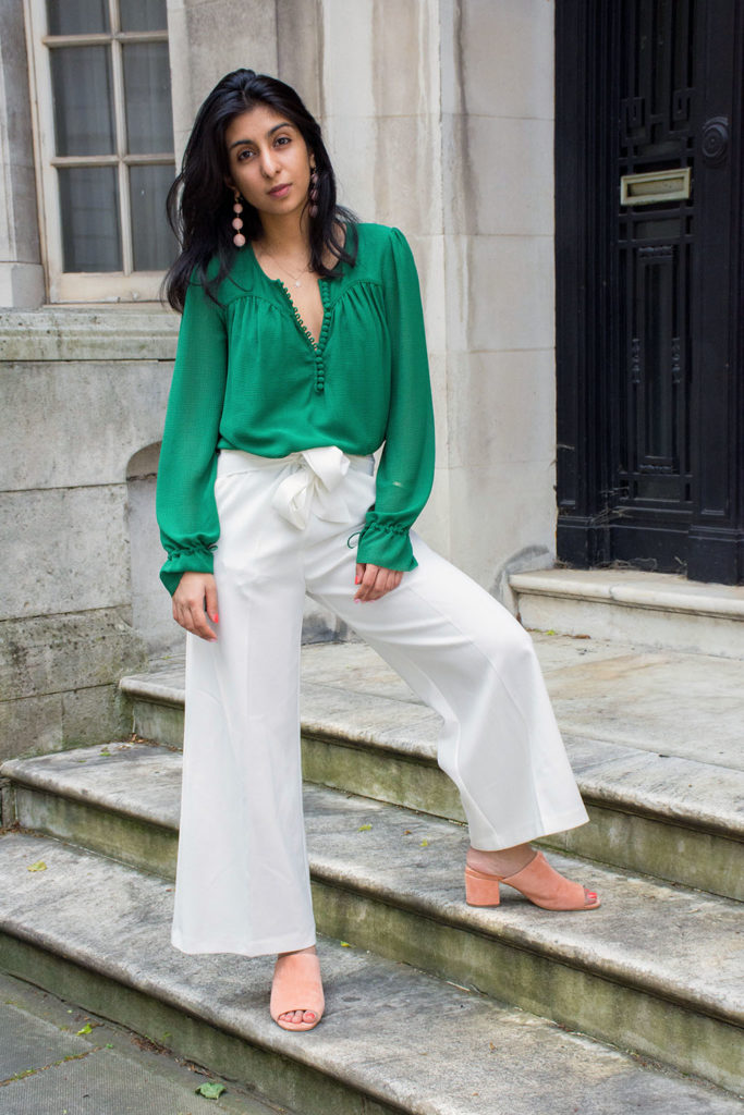 Fashion blogger Shloka Narang of The Silk Sneaker showcases the best summer pants for the London heatwave featuring Topshop and Ba&sh
