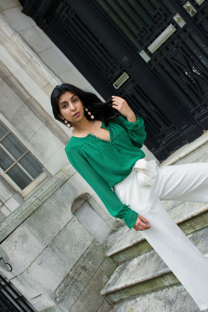 Fashion blogger Shloka Narang of The Silk Sneaker showcases the best summer pants for the London heatwave featuring Topshop and Ba&sh