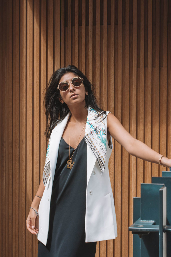Fashion blogger Shloka Narang of The Silk Sneaker showcases how to style a slip dress for autumn