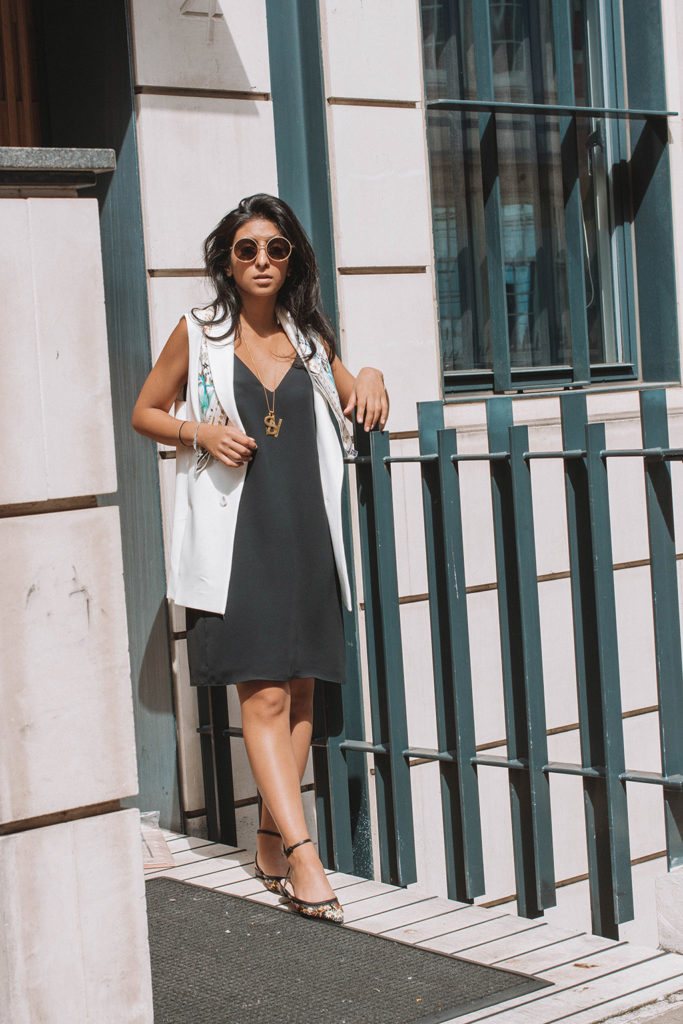Fashion blogger Shloka Narang of The Silk Sneaker showcases how to style a slip dress for autumn