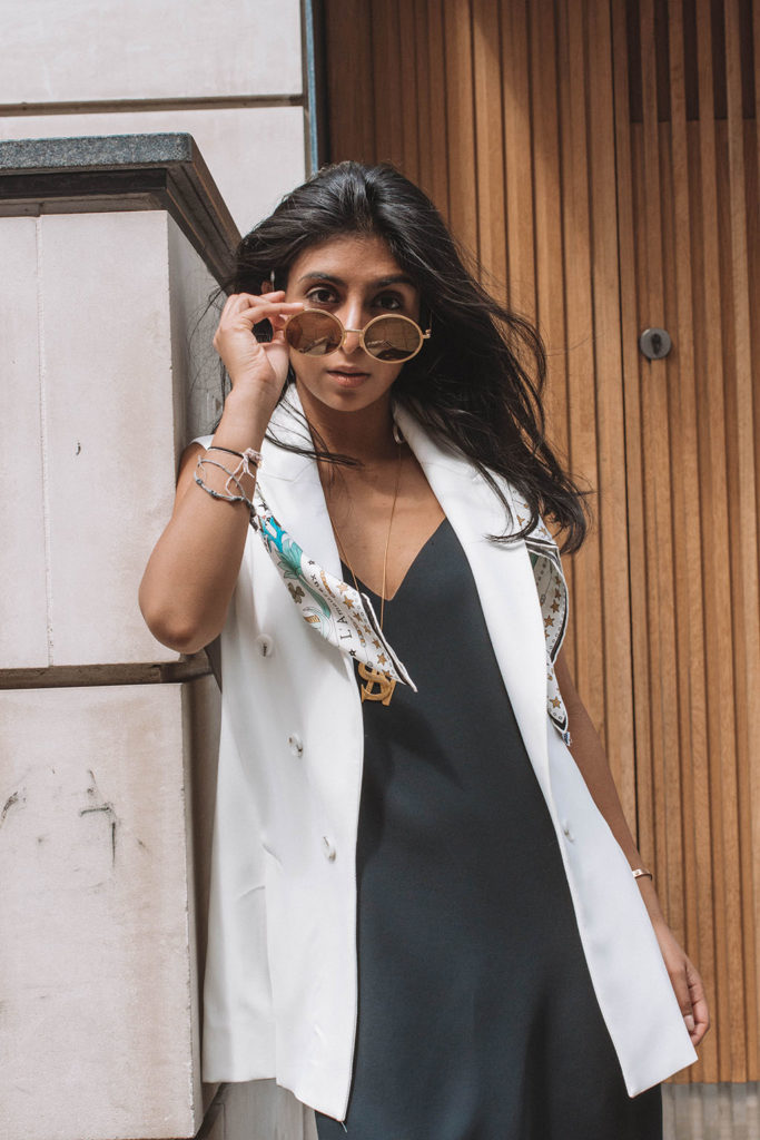 Fashion blogger Shloka Narang of The Silk Sneaker showcases how to style a slip dress for autumn
