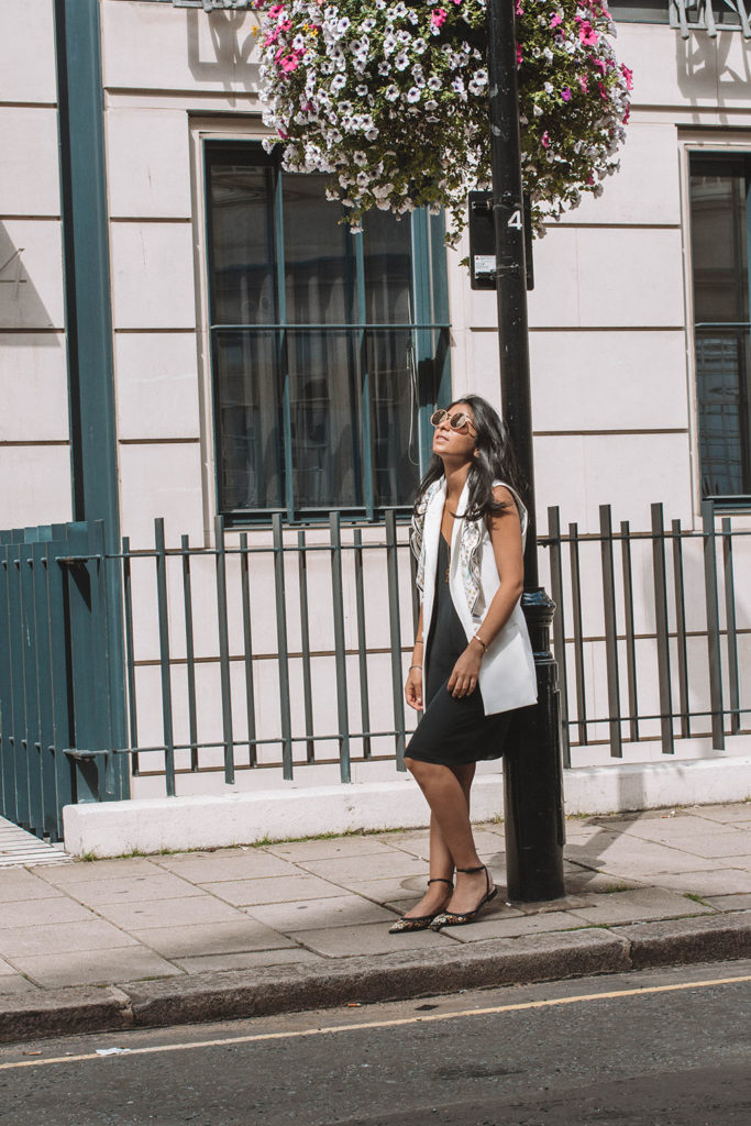 Fashion blogger Shloka Narang of The Silk Sneaker showcases how to style a slip dress for autumn