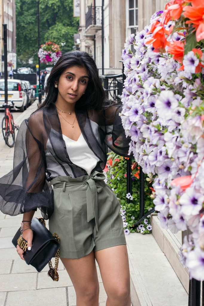 Fashion blogger Shloka Narang of The Silk Sneaker showcases how to wear a sheer top