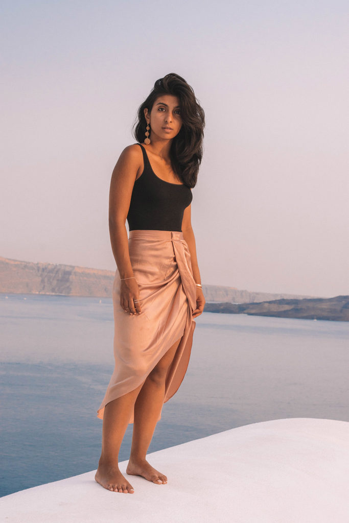 Fashion blogger Shloka Narang of The Silk Sneaker showcases how to look glamorous on your holiday with Wolford in Santorini