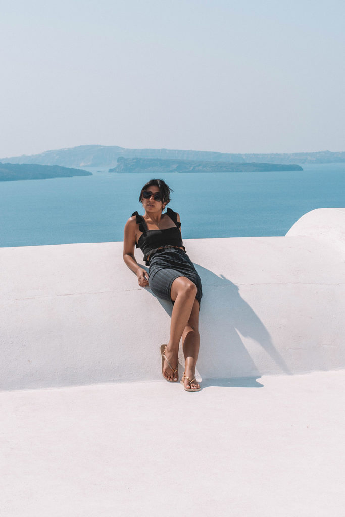 Fashion blogger Shloka Narang of The Silk Sneaker showcases how to look glamorous on your holiday with Wolford in Santorini